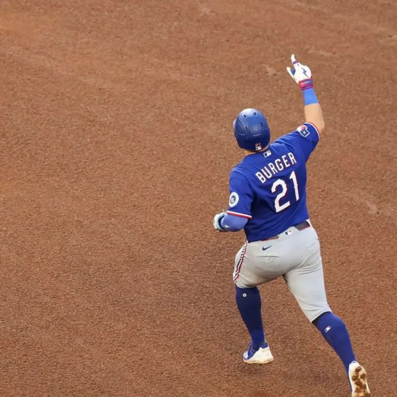 Texas Rangers and Houston Astros players in action during a baseball game
