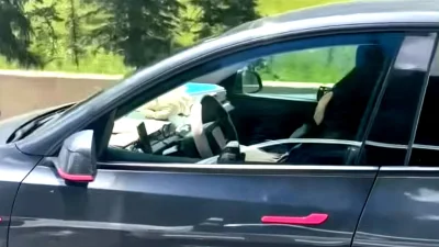 Tesla Driver Appears to Nap at 62 MPH with Two Kids in Back Seat