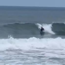 Great White Shark Breaches Near Unsuspecting Boogie Boarder in Newport Beach